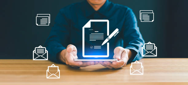 istock Collaboration, signature, document verification, electronic signature, paperless office document management, business people signing electronic documents on virtual cardboard. 2048219596