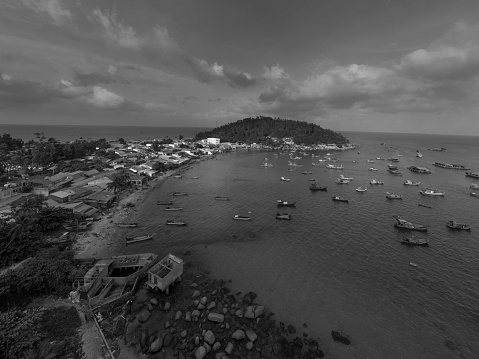 Recife, Pernambuco, Brazil - April 16, 2021: Worker of the fishermen's colony in the Pina neighborhood