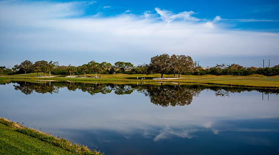 Views of the TPC golf course at Prestancia in Sarasota Florida.  This course is very similar to other golf communities throughout Florida with ponds and residential housing surrounding the fairways.