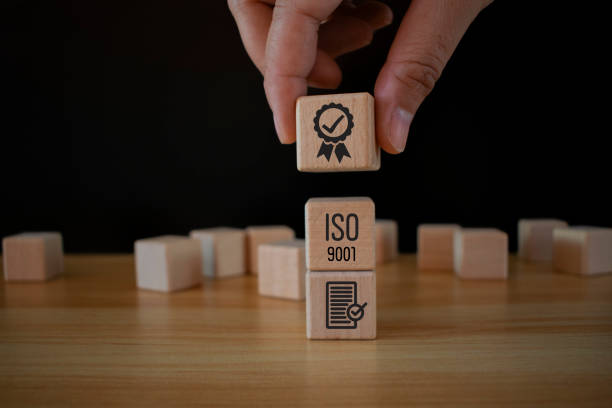 istock ISO certificate icon on  wooden cubes, warranty, standardization, certified, quality, control. Quality control certification and standardization. International standards quality assurance concept. 2048344866