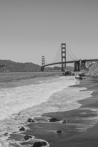 sandy beach under the golden gate bridge in San Francisco Bay