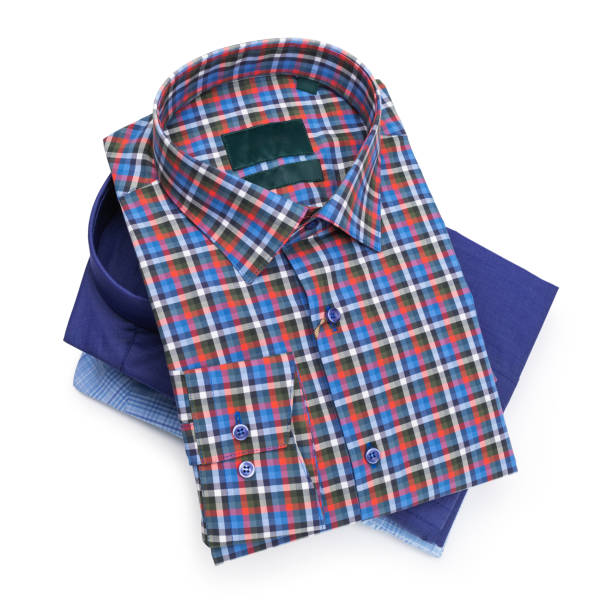 istock Three folded men's long sleeve button down shirts isolated on white background 2048356006