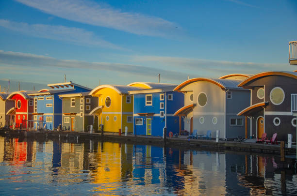 Multi coloured float homes in a row at Mosquito Creek Marina, North Vancouver, BC