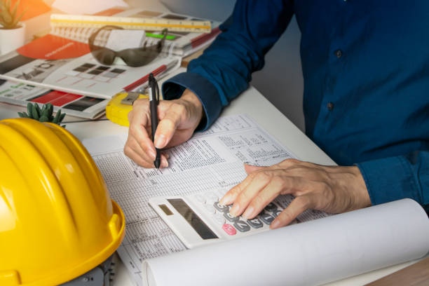 Engineers sit and work on building design and system work.,construction work safety,construction business and real estate stock photo
