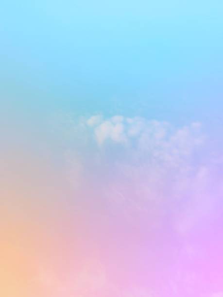 istock Creative color combinations  pastel rainbow gradient  On the background of the sky and soft clouds of nature, subtle and beautiful. 2048412541