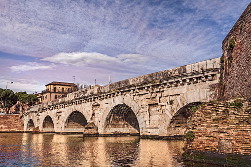 Rimini, Emilia Romagna, Italy. The ancient Roman arch bridge of Tiberius, historical Italian landmark