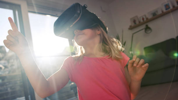 istock Female child enjoying using virtual reality glasses 2048476282