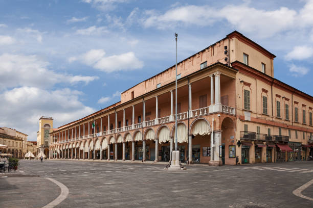 Faenza, Ravenna, Emilia Romagna, Italy. Piazza del Popolo (People's Square) with the characteristic double portico on the facade of the medieval palace of the city famous for artistic ceramics