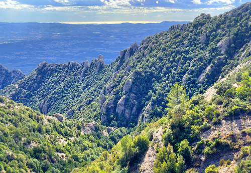 Montserrat mountain landscape, view from high peak to sea, hiking way, spring nature