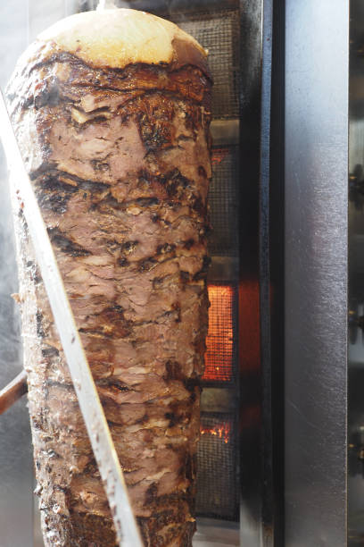 istock rotating traditional gyros meat close up 2048552513