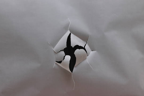 istock Torn hole in transparent paper 2048555707