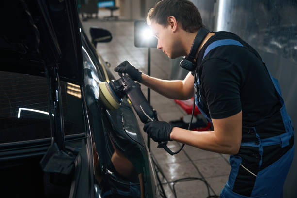 istock Car detailing professional buffing auto body exterior surface using polisher 2048573336