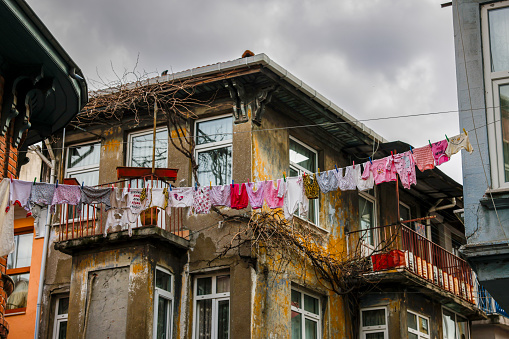 laundry hanging outside old buildings