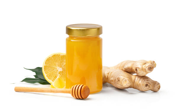 istock Honey with lemon and ginger on white background. 2048591561