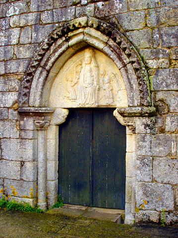Small opening in a large stone structure