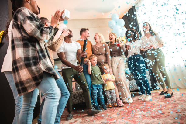 istock Joyful Diverse Group Celebrating Gender Reveal for Baby Boy 2048619145