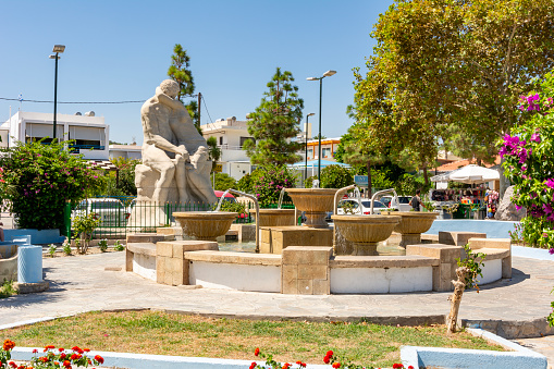 Rhodes, Greece - September 2018: Fountain on Faliraki main square