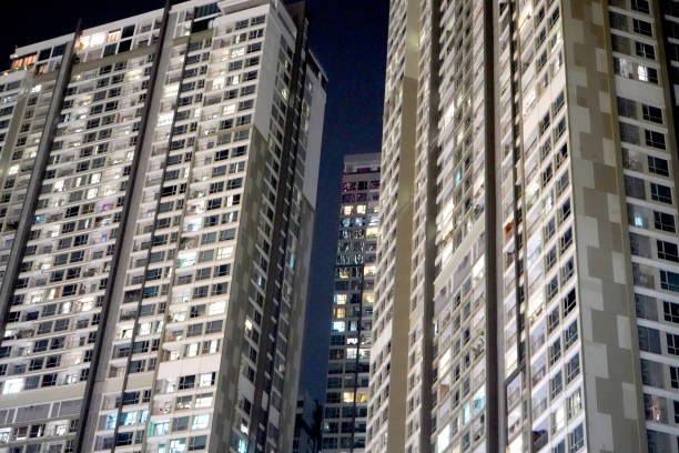 istock Low angle view of modern skyscrapers at night 2048649401