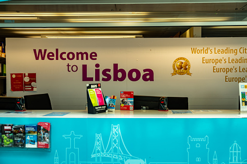 Lisbon, Portugal - October 5, 2023: Welcome to Lisbon sign in arrive area of Humberto Delgado Airport, Lisbon, Portugal. 
Aeroporto Humberto Delgado Lisboa.