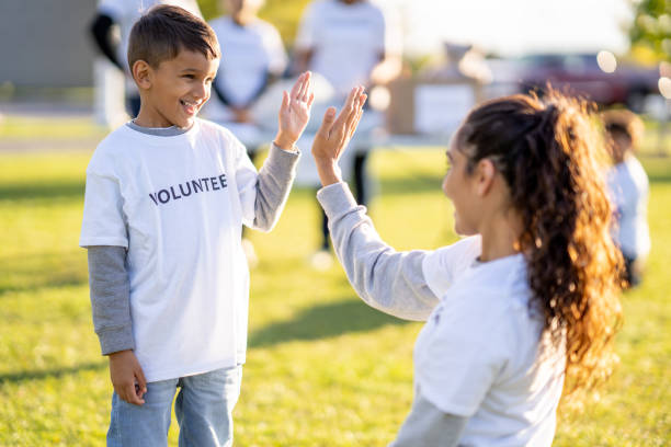 istock High-Fives For Volunteering Success! 2048705046
