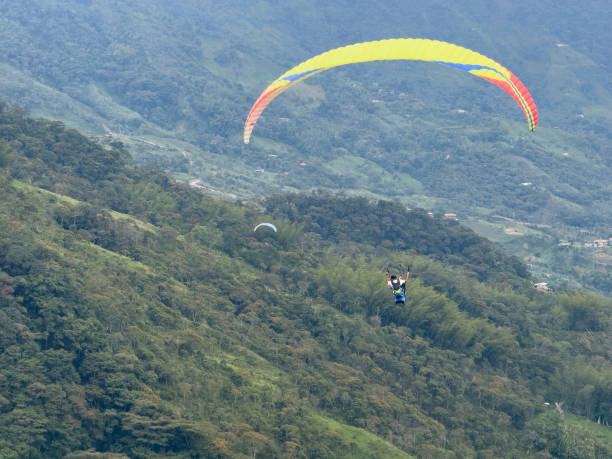 istock Paraglider flying over Cocorna area 2048734763