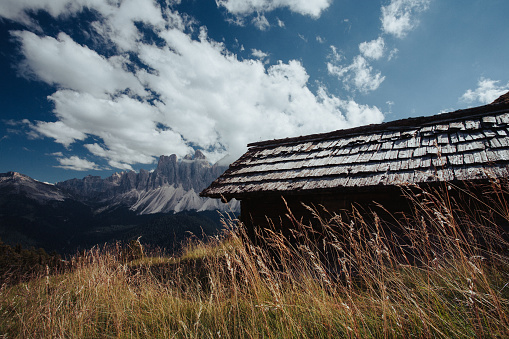 Outdoor iconic landscapes on the Dolomites: rocky mountains and dramatic skies