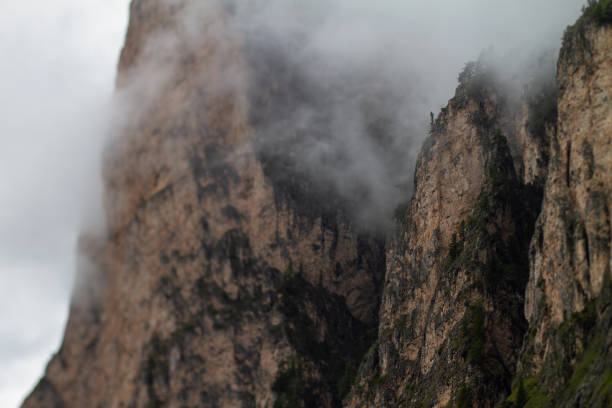 Outdoor iconic landscapes on the Dolomites: rocky mountains and dramatic skies