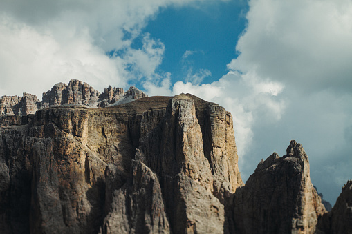 Outdoor iconic landscapes on the Dolomites: rocky mountains and dramatic skies
