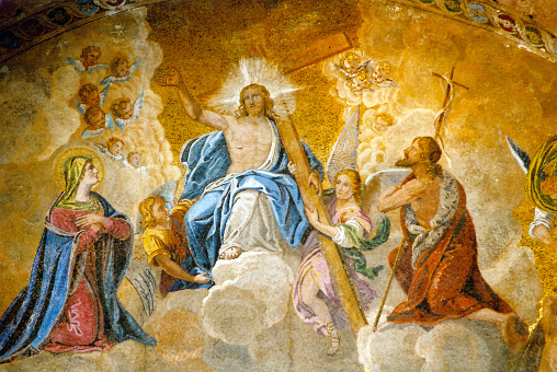 Venice, Veneto, Italy: gilded mosaic with Jesus Christ in heaven holding the cross, with angels, the Virgin and St John the Baptist, over the main entrance of St Mark's Cathedral - 'The Last Judgment', the original Byzantine mosaic was destroyed by a fire and this replica by Lattanzio Querena was installed in 1836.