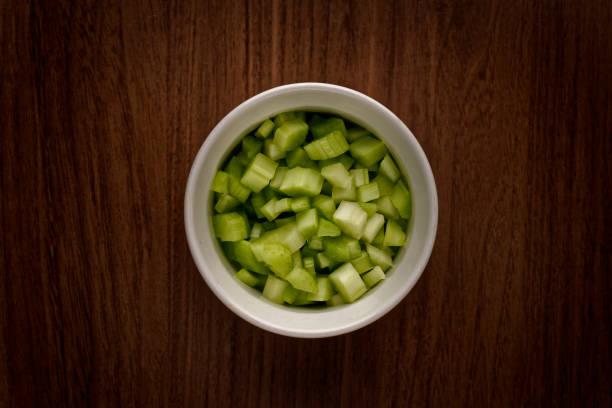 istock Top view of a white bowl filled with freshly chopped celery 2048868149