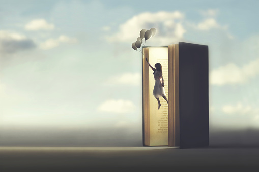 surreal woman comes out of an open book flying hanging from balloons, abstract concept