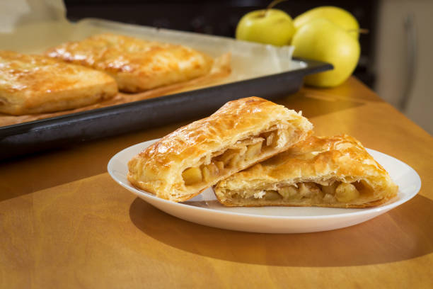 istock Homemade puff pastry pie filled with apple and cinnamon 2048966814