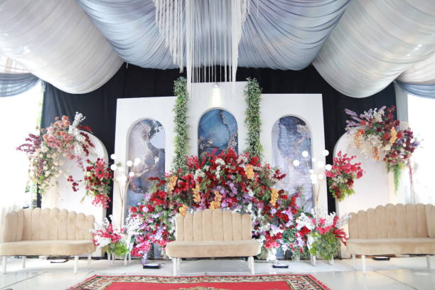 istock White theme wedding decoration and lots of flowers 2049013021