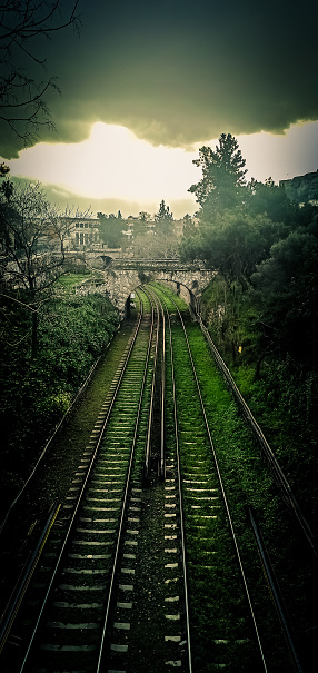 View of the tracks of Athens Metro line 1 from Thiseio at dawn