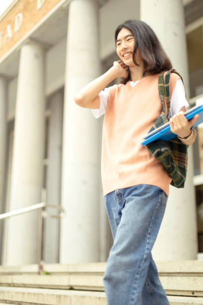 istock happy young male student leaving class 2049019697