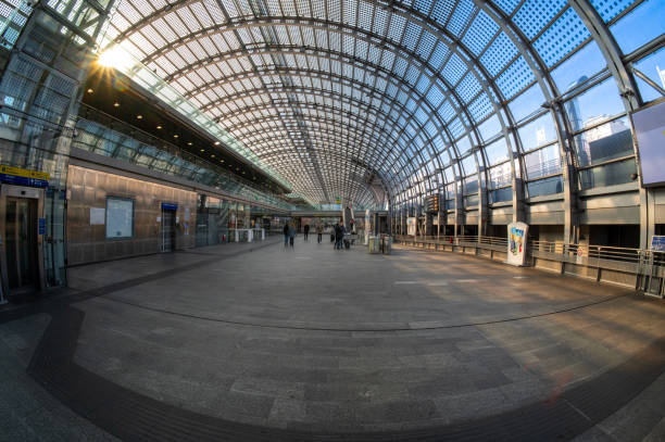 Milan, Italy - March 17, 2025 : Milano Centrale station facade with neoclassical architecture and statues