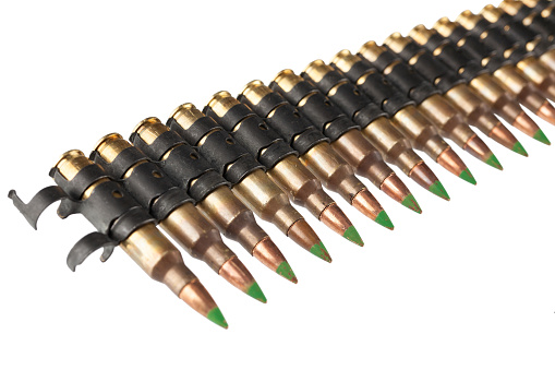 5.56mm ammunition belt with cartridges isolated on white background