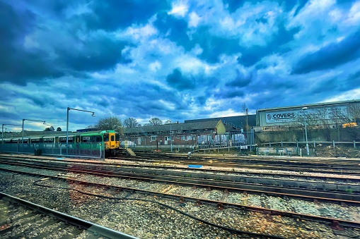 Horsham, United Kingdom - March 06 2022: a train is driving on a railway infrastructure for public transport near London