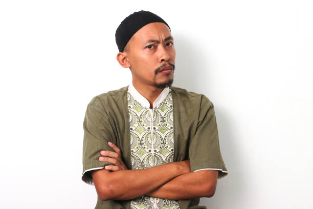 istock Thoughtful Indonesian Muslim Man, Crossed Arms 2049202631