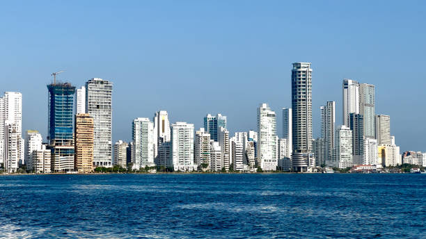 istock Modern buildings in city against clear blue sky 2049222939