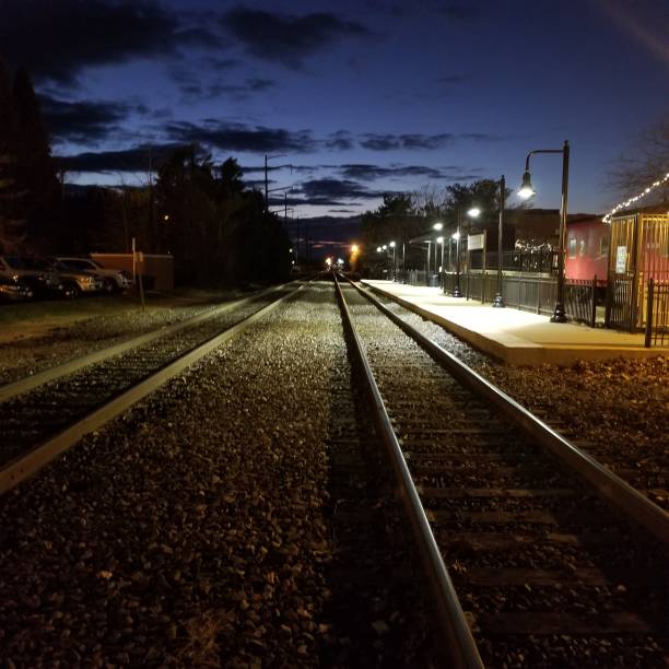 istock Railroad tracks at sunset 2049263226