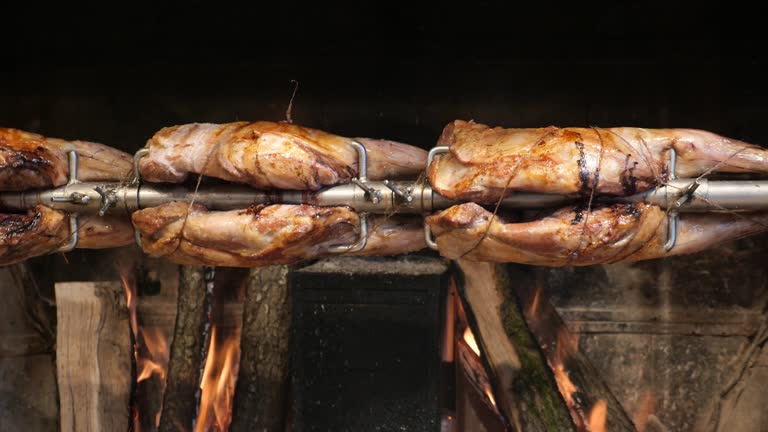 Grilled roasted mutton meat on spit at street food market