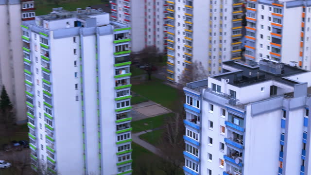 AERIAL Drone Shot of Residential Buildings Painted in Different Colors in Slovenia