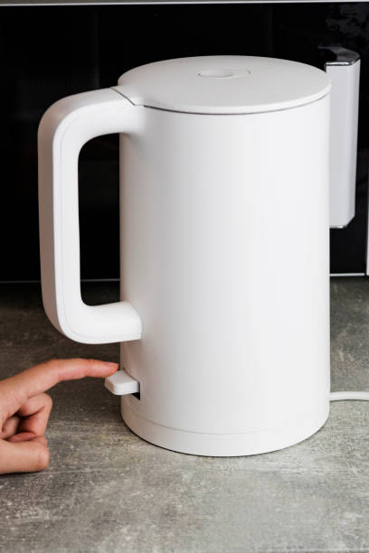istock Includes an electric kettle for boiling water. Energy saving concept, expensive electricity 2049699185