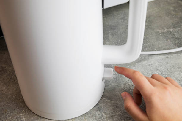 istock Includes an electric kettle for boiling water. Energy saving concept, expensive electricity 2049700739