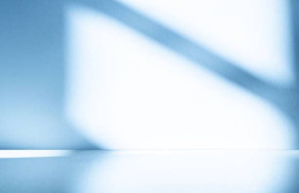 istock Wall interior background, studio, and backdrops show products. with shadow from window color white and blue light. background for text insertion and presentation of product 2049700746