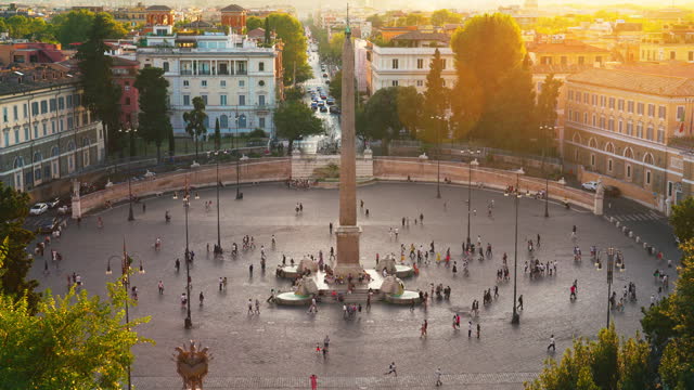 Top view Crowd of People tourist walking and sightseeing attraction at Piazza del Popolo landmark square centered by Rome's oldest obelisk and gateway with marble columns in summer in Rome, Italy