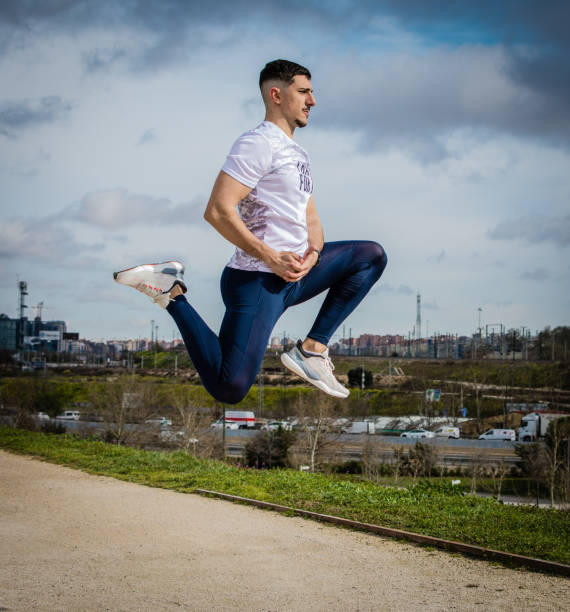 istock Young fit man practicing martial arts outdoors 2049759351
