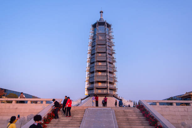 Young adult male traveling in Southeast Asia and visiting white temple, Myanmar. People travel concept.