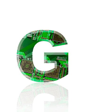Close-up of three-dimensional circuit board alphabet letter G on white background.